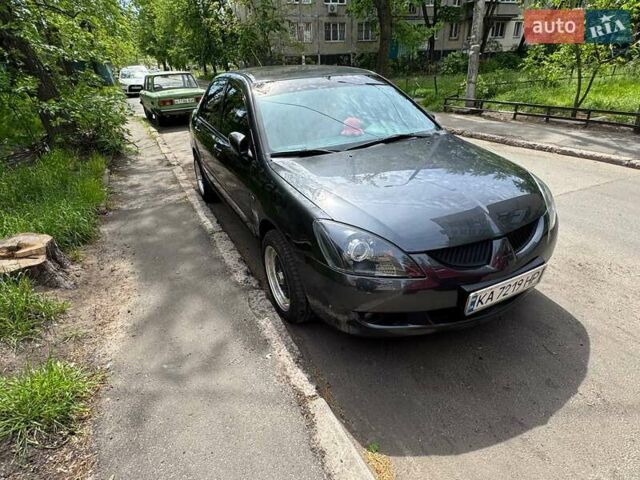 Сірий Міцубісі Lancer, об'ємом двигуна 1.6 л та пробігом 272 тис. км за 5100 $, фото 8 на Automoto.ua