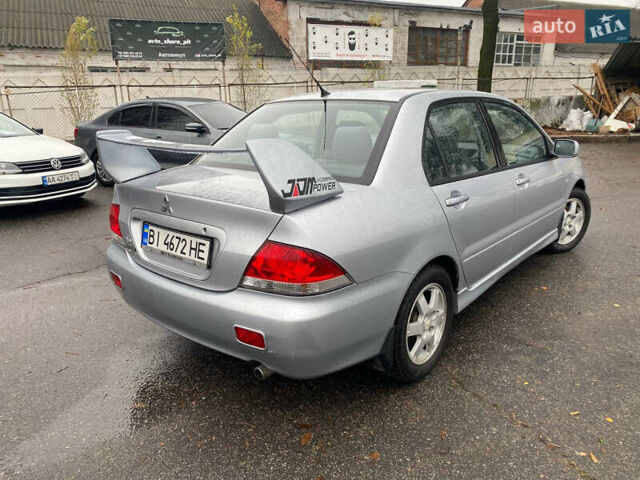 Сірий Міцубісі Lancer, об'ємом двигуна 1.6 л та пробігом 171 тис. км за 4600 $, фото 3 на Automoto.ua