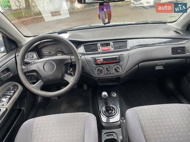 Сірий Міцубісі Lancer, об'ємом двигуна 1.6 л та пробігом 171 тис. км за 4600 $, фото 8 на Automoto.ua