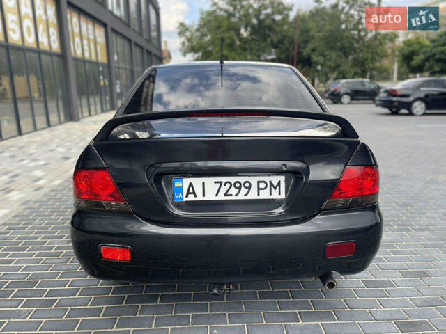 Сірий Міцубісі Lancer, об'ємом двигуна 1.6 л та пробігом 250 тис. км за 3300 $, фото 6 на Automoto.ua
