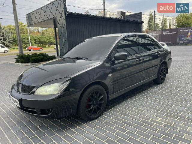 Сірий Міцубісі Lancer, об'ємом двигуна 1.6 л та пробігом 250 тис. км за 3300 $, фото 2 на Automoto.ua