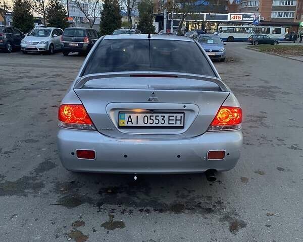 Мицубиси Лансер 2003 в Белой Церкве на Automoto.ua Серый Мицубиси Лансер, объемом двигателя 1.58 л и пробегом 350 тыс. км за 3300 $, фото 3 на Automoto.ua