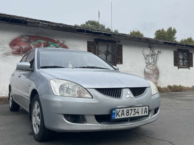 Сірий Міцубісі Lancer, об'ємом двигуна 1.6 л та пробігом 343 тис. км за 3850 $, фото 12 на Automoto.ua