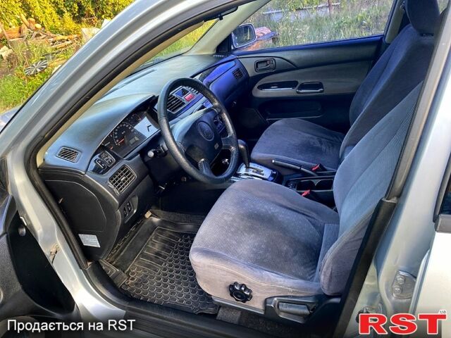 Сірий Міцубісі Lancer, об'ємом двигуна 1.6 л та пробігом 390 тис. км за 4400 $, фото 6 на Automoto.ua
