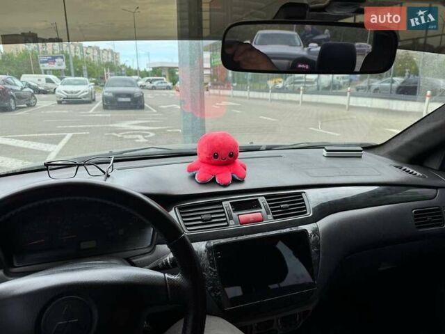 Сірий Міцубісі Lancer, об'ємом двигуна 1.6 л та пробігом 272 тис. км за 5100 $, фото 2 на Automoto.ua