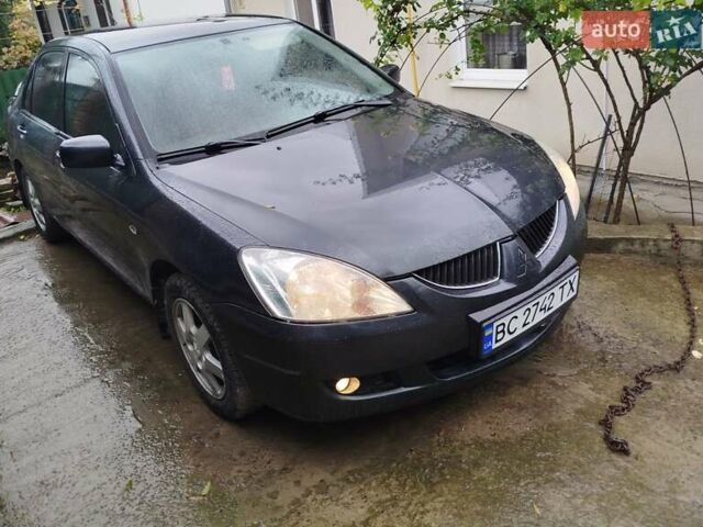 Сірий Міцубісі Lancer, об'ємом двигуна 1.6 л та пробігом 260 тис. км за 2799 $, фото 3 на Automoto.ua