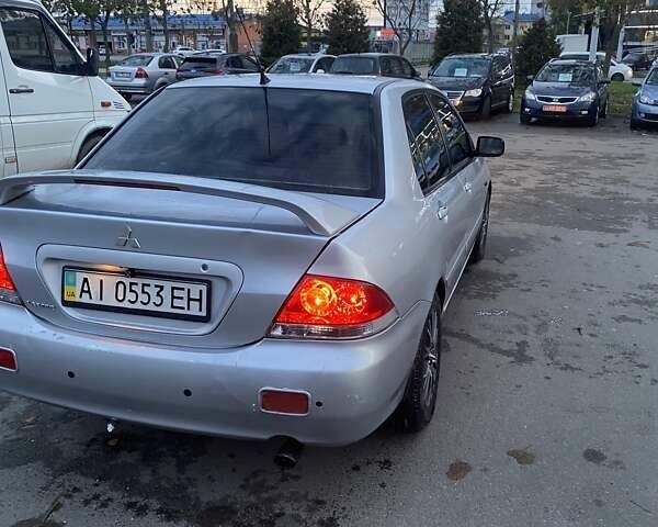Мицубиси Лансер 2003 в Белой Церкве на Automoto.ua Серый Мицубиси Лансер, объемом двигателя 1.58 л и пробегом 350 тыс. км за 3300 $, фото 4 на Automoto.ua