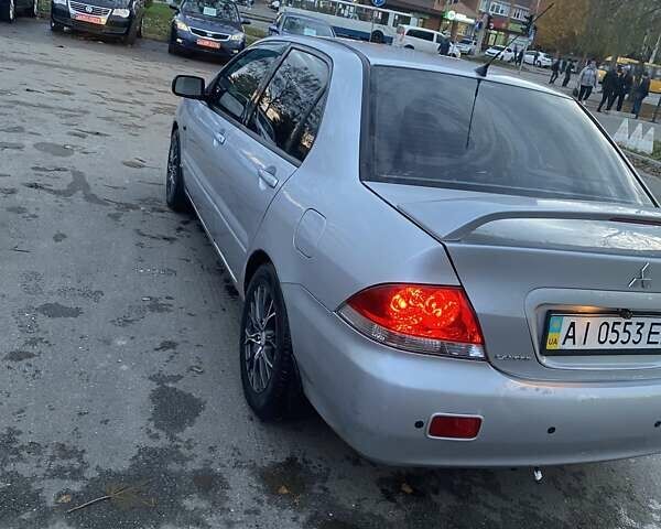 Мицубиси Лансер 2003 в Белой Церкве на Automoto.ua Серый Мицубиси Лансер, объемом двигателя 1.58 л и пробегом 350 тыс. км за 3300 $, фото 5 на Automoto.ua