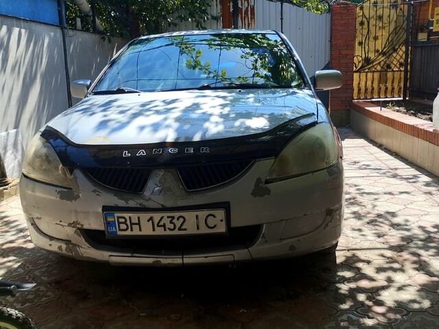 Сірий Міцубісі Lancer, об'ємом двигуна 1.6 л та пробігом 308 тис. км за 3500 $, фото 11 на Automoto.ua