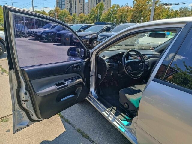 Сірий Міцубісі Lancer, об'ємом двигуна 1.6 л та пробігом 284 тис. км за 4330 $, фото 18 на Automoto.ua