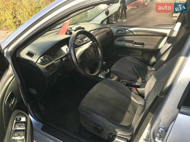 Сірий Міцубісі Lancer, об'ємом двигуна 1.3 л та пробігом 376 тис. км за 3700 $, фото 13 на Automoto.ua