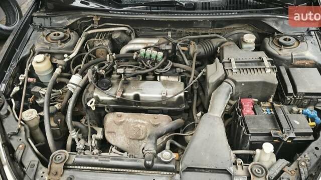 Сірий Міцубісі Lancer, об'ємом двигуна 1.58 л та пробігом 110 тис. км за 2999 $, фото 15 на Automoto.ua