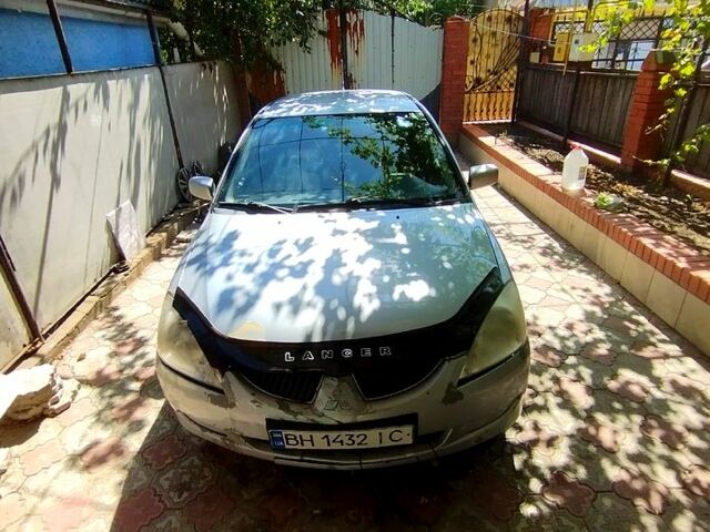 Сірий Міцубісі Lancer, об'ємом двигуна 1.6 л та пробігом 308 тис. км за 3500 $, фото 9 на Automoto.ua