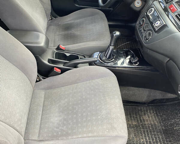 Сірий Міцубісі Lancer, об'ємом двигуна 1.58 л та пробігом 268 тис. км за 3799 $, фото 13 на Automoto.ua