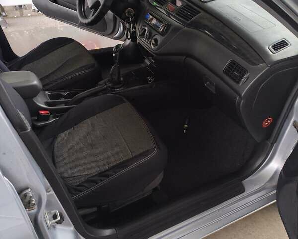 Сірий Міцубісі Lancer, об'ємом двигуна 1.58 л та пробігом 320 тис. км за 3700 $, фото 10 на Automoto.ua
