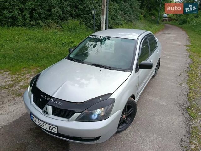 Сірий Міцубісі Lancer, об'ємом двигуна 2 л та пробігом 240 тис. км за 4000 $, фото 1 на Automoto.ua
