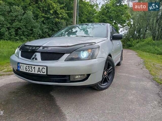 Сірий Міцубісі Lancer, об'ємом двигуна 2 л та пробігом 240 тис. км за 4000 $, фото 2 на Automoto.ua