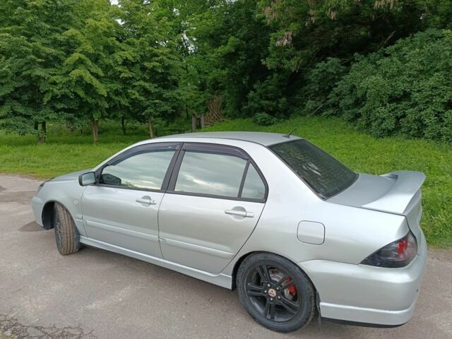 Сірий Міцубісі Lancer, об'ємом двигуна 2 л та пробігом 240 тис. км за 3500 $, фото 2 на Automoto.ua