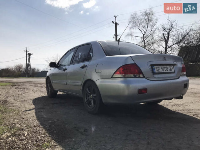 Мицубиси Лансер 2004 в Днепре (Днепропетровске) на Automoto.ua Серый Мицубиси Лансер, объемом двигателя 1.59 л и пробегом 294 тыс. км за 4699 $, фото 3 на Automoto.ua