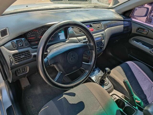 Сірий Міцубісі Lancer, об'ємом двигуна 1.6 л та пробігом 284 тис. км за 4330 $, фото 20 на Automoto.ua