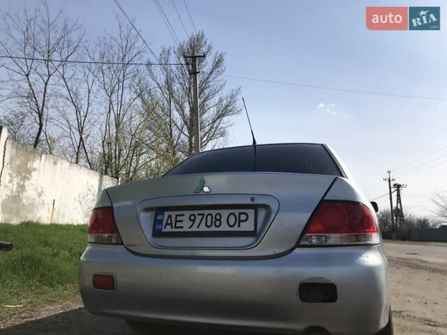 Мицубиси Лансер 2004 в Днепре (Днепропетровске) на Automoto.ua Серый Мицубиси Лансер, объемом двигателя 1.59 л и пробегом 294 тыс. км за 4699 $, фото 5 на Automoto.ua