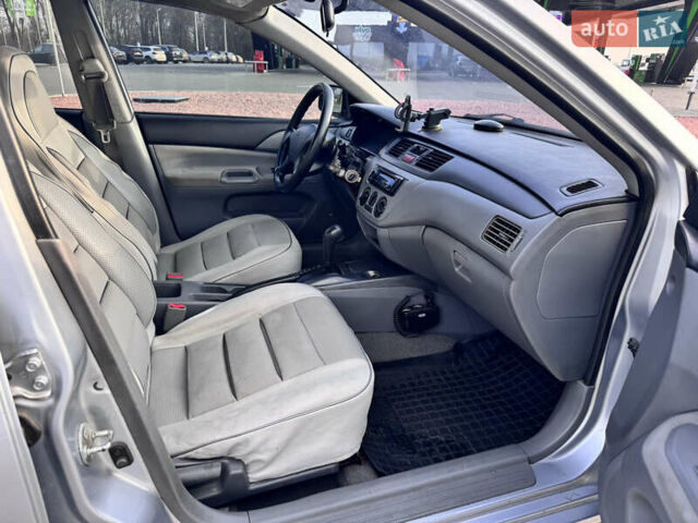 Сірий Міцубісі Lancer, об'ємом двигуна 1.3 л та пробігом 450 тис. км за 2650 $, фото 11 на Automoto.ua