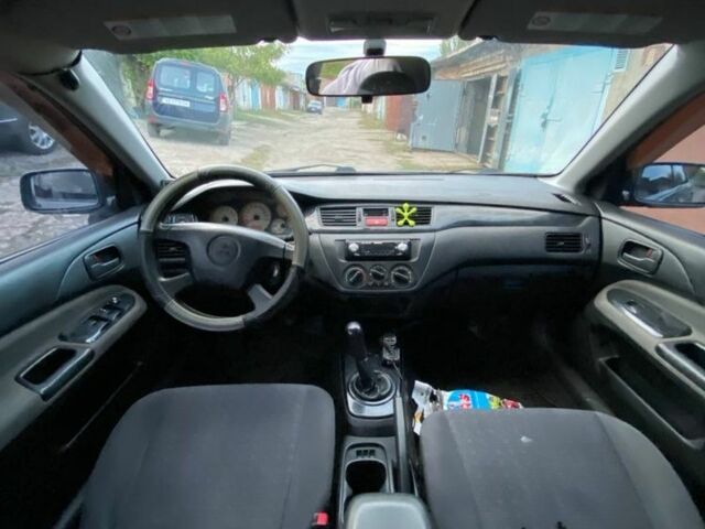 Сірий Міцубісі Lancer, об'ємом двигуна 1.6 л та пробігом 307 тис. км за 3700 $, фото 6 на Automoto.ua
