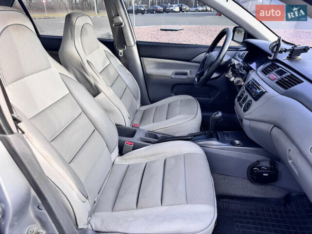 Сірий Міцубісі Lancer, об'ємом двигуна 1.3 л та пробігом 450 тис. км за 2650 $, фото 17 на Automoto.ua