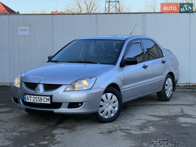 Серый Мицубиси Лансер, объемом двигателя 1.6 л и пробегом 320 тыс. км за 3650 $, фото 12 на Automoto.ua