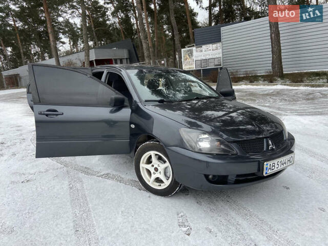 Серый Мицубиси Лансер, объемом двигателя 1.58 л и пробегом 265 тыс. км за 3499 $, фото 15 на Automoto.ua