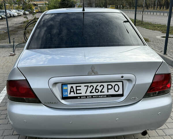 Серый Мицубиси Лансер, объемом двигателя 1.29 л и пробегом 263 тыс. км за 3400 $, фото 3 на Automoto.ua