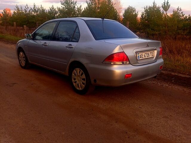 Сірий Міцубісі Lancer, об'ємом двигуна 1.6 л та пробігом 280 тис. км за 3700 $, фото 4 на Automoto.ua