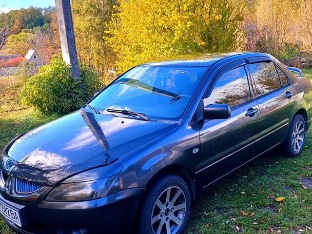 Сірий Міцубісі Lancer, об'ємом двигуна 1.6 л та пробігом 0 тис. км за 3000 $, фото 1 на Automoto.ua