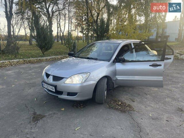Мицубиси Лансер 2004 в Теофиполь на Automoto.ua Серый Мицубиси Лансер, объемом двигателя 1.58 л и пробегом 270 тыс. км за 3350 $, фото 12 на Automoto.ua