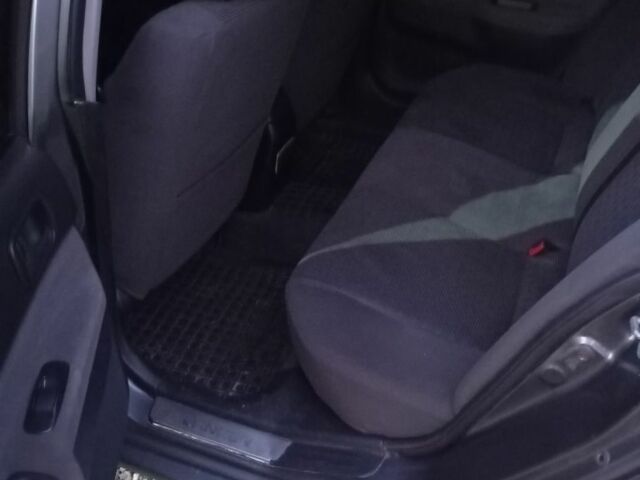 Мицубиси Лансер 2004 в Черкассах на Automoto.ua Серый Мицубиси Лансер, объемом двигателя 1.6 л и пробегом 313 тыс. км за 4800 $, фото 4 на Automoto.ua