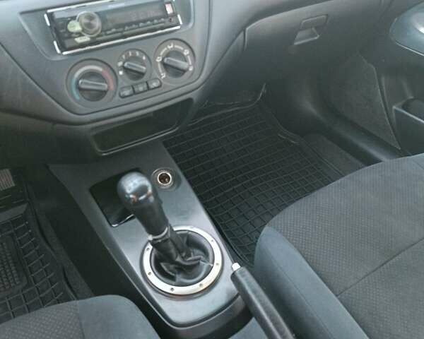 Мицубиси Лансер 2004 в Нежине на Automoto.ua Серый Мицубиси Лансер, объемом двигателя 2 л и пробегом 280 тыс. км за 6000 $, фото 1 на Automoto.ua