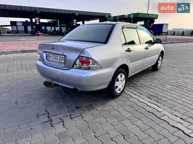 Сірий Міцубісі Lancer, об'ємом двигуна 1.3 л та пробігом 450 тис. км за 2850 $, фото 6 на Automoto.ua