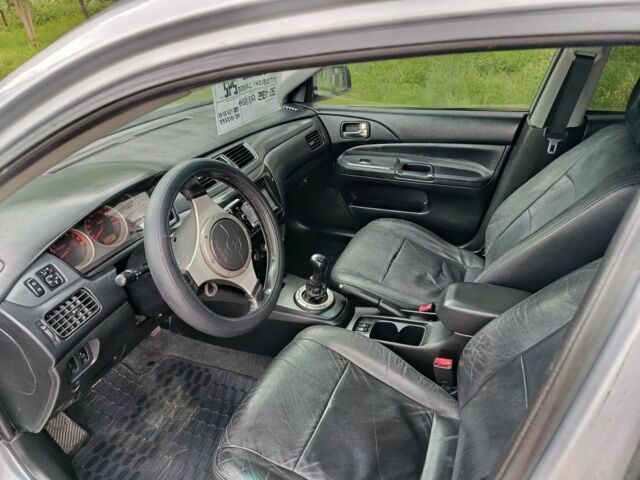 Сірий Міцубісі Lancer, об'ємом двигуна 2 л та пробігом 240 тис. км за 3500 $, фото 6 на Automoto.ua