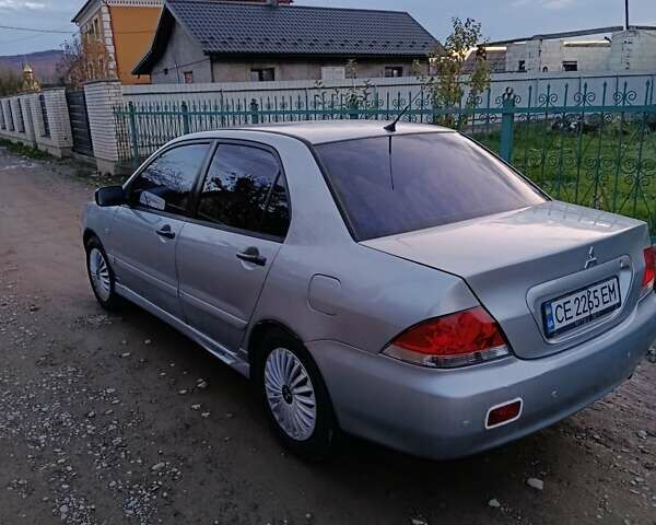 Мицубиси Лансер 2004 в Черновцах на Automoto.ua Серый Мицубиси Лансер, объемом двигателя 1.58 л и пробегом 439 тыс. км за 2750 $, фото 4 на Automoto.ua
