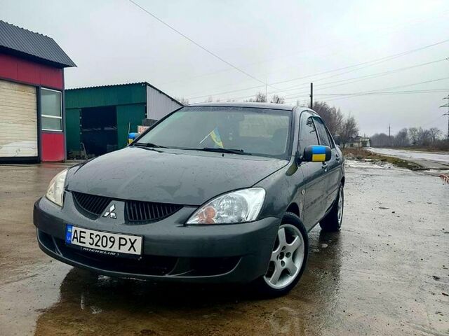 Сірий Міцубісі Lancer, об'ємом двигуна 2 л та пробігом 185 тис. км за 4900 $, фото 4 на Automoto.ua