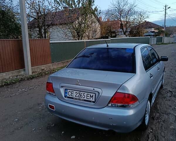 Мицубиси Лансер 2004 в Черновцах на Automoto.ua Серый Мицубиси Лансер, объемом двигателя 1.58 л и пробегом 439 тыс. км за 2750 $, фото 10 на Automoto.ua