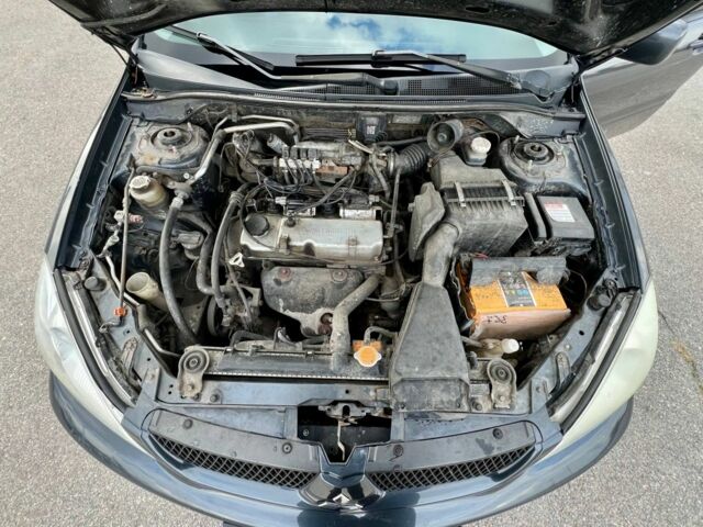 Серый Мицубиси Лансер, объемом двигателя 1.6 л и пробегом 490 тыс. км за 1799 $, фото 19 на Automoto.ua