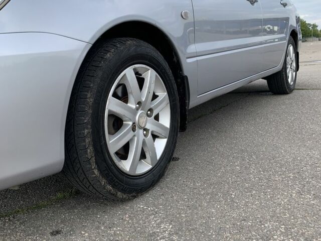 Сірий Міцубісі Lancer, об'ємом двигуна 1.6 л та пробігом 285 тис. км за 4450 $, фото 2 на Automoto.ua