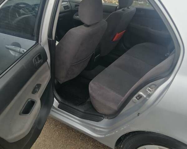 Міцубісі Lancer 2004 у Харкові на Automoto.ua Сірий Міцубісі Lancer, об'ємом двигуна 1.58 л та пробігом 248 тис. км за 3550 $, фото 3 на Automoto.ua