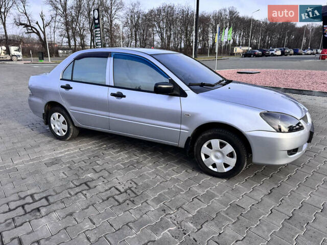 Сірий Міцубісі Lancer, об'ємом двигуна 1.3 л та пробігом 450 тис. км за 2650 $, фото 7 на Automoto.ua