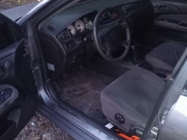 Мицубиси Лансер 2004 в Черкассах на Automoto.ua Серый Мицубиси Лансер, объемом двигателя 1.6 л и пробегом 313 тыс. км за 4800 $, фото 2 на Automoto.ua