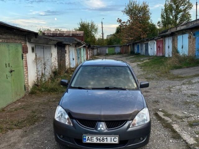 Сірий Міцубісі Lancer, об'ємом двигуна 1.6 л та пробігом 307 тис. км за 3700 $, фото 2 на Automoto.ua