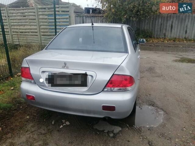 Міцубісі Lancer 2004 у Харкові на Automoto.ua Сірий Міцубісі Lancer, об'ємом двигуна 1.58 л та пробігом 248 тис. км за 3550 $, фото 5 на Automoto.ua