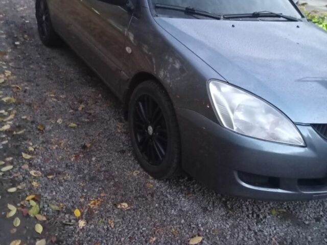 Мицубиси Лансер 2004 в Черкассах на Automoto.ua Серый Мицубиси Лансер, объемом двигателя 1.6 л и пробегом 313 тыс. км за 4800 $, фото 6 на Automoto.ua