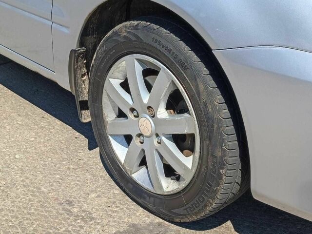 Сірий Міцубісі Lancer, об'ємом двигуна 1.6 л та пробігом 284 тис. км за 4330 $, фото 5 на Automoto.ua